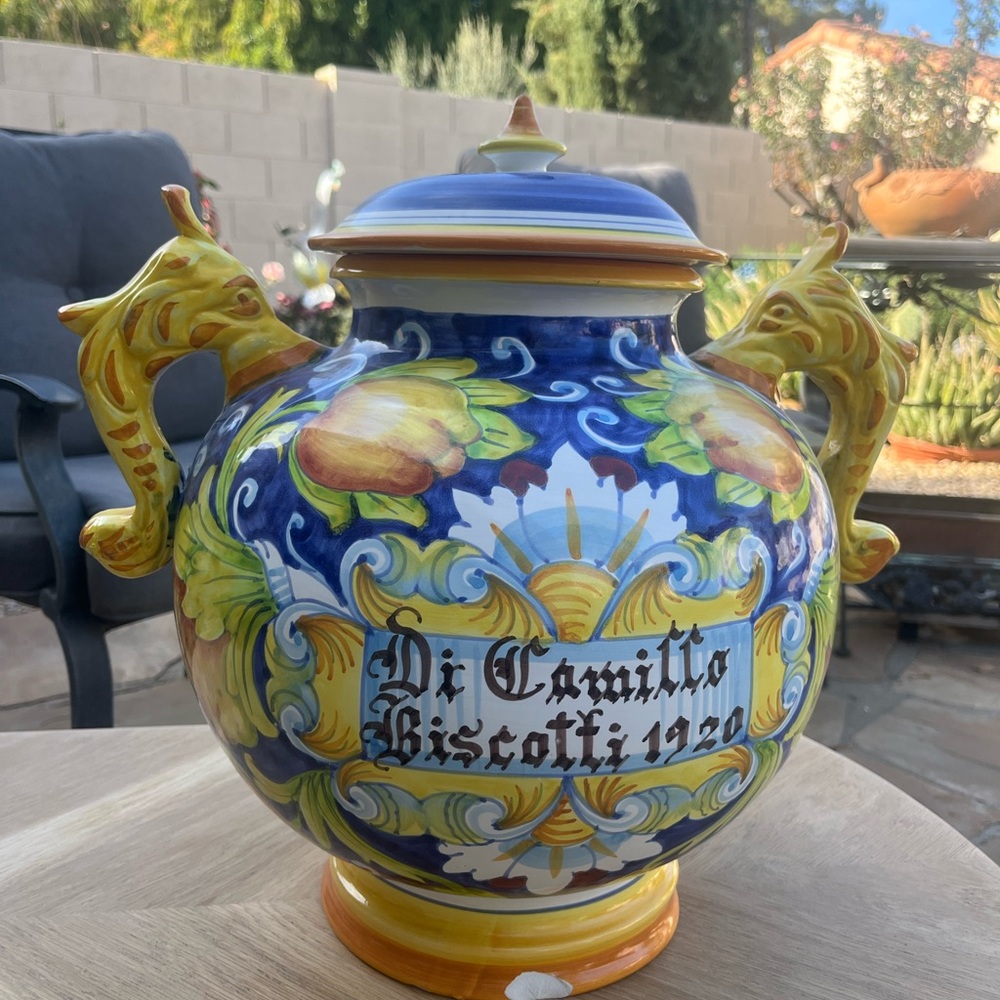 Vibrant Blue and Yellow Ceramic Jar with Giraffe Handles